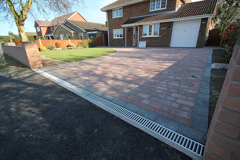 Block paved driveway at the front of a property