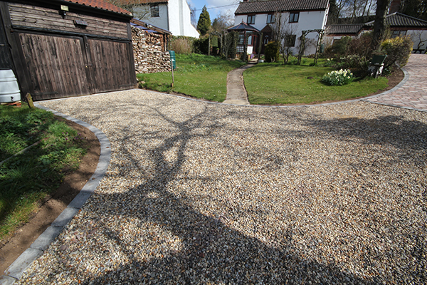 Landscaped garden and driveway