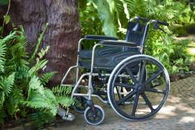 A wheelchair in a wheelchair accessible garden.